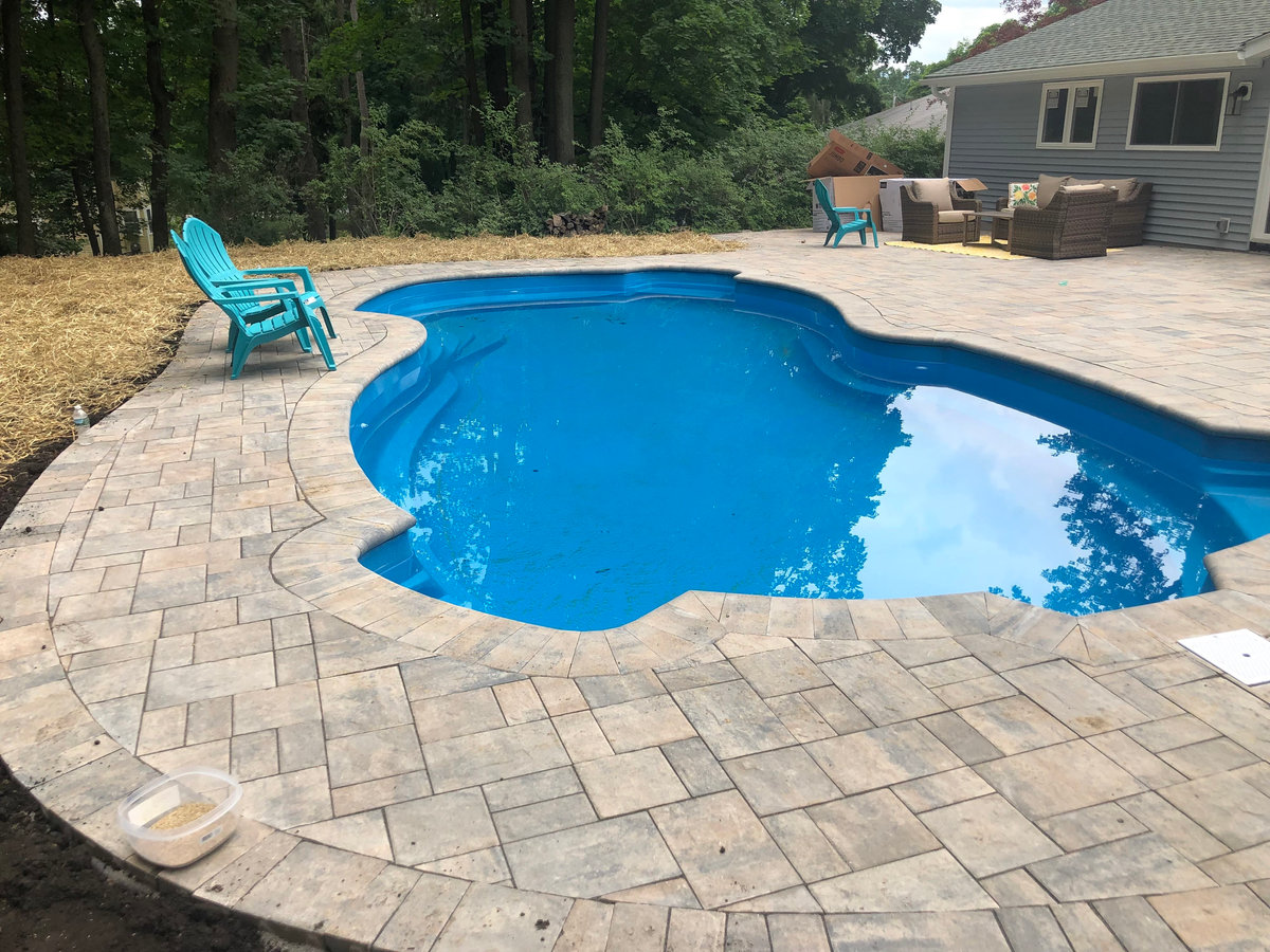 Paver patio around pool